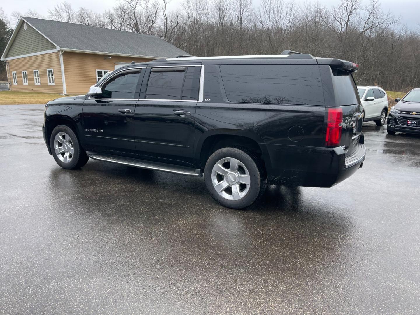 2016 Black /Brown Chevrolet Suburban LTZ 4WD (1GNSKJKC3GR) with an 5.3L V8 OHV 16V engine, 6A transmission, located at 11115 Chardon Rd. , Chardon, OH, 44024, (440) 214-9705, 41.580246, -81.241943 - Photo#12